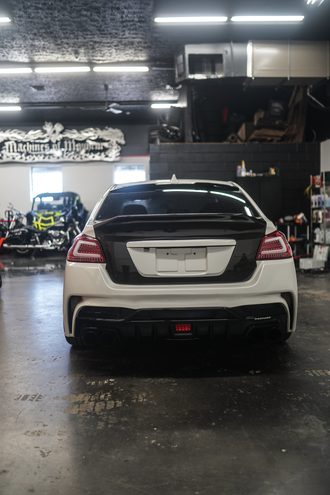 JDMuscle Gloss Black / Paint Matched License Plate Backing - 15-21 WRX/STI image 0