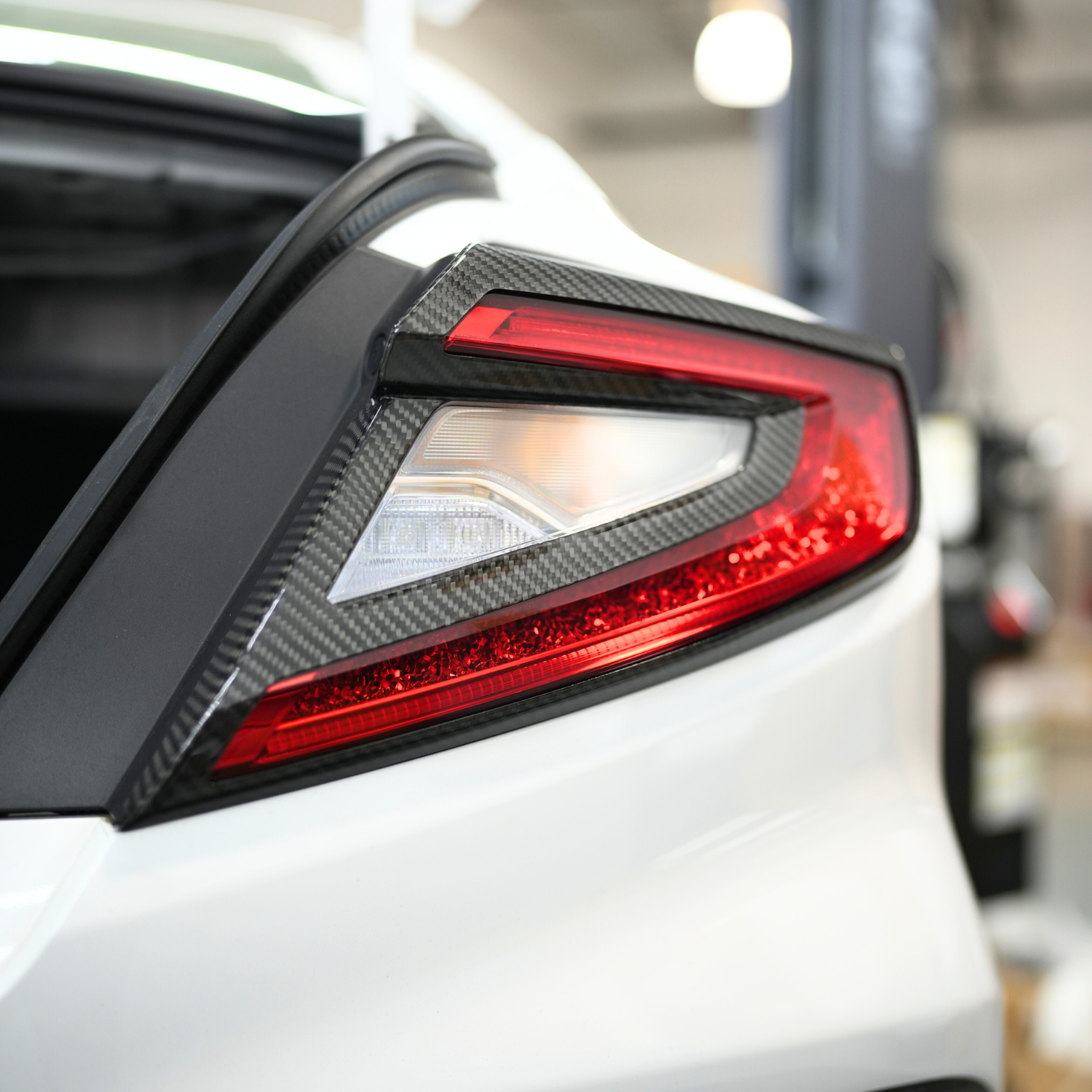 JDMuscle [22-25 WRX] Tanso Dry Carbon Fiber Tail Light Covers image 0