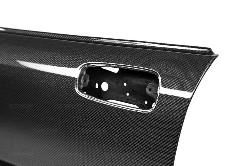 OE-style carbon fiber doors for 2002-2007 Subaru Impreza/WRX/STi (FRONT) - Offroad use only
